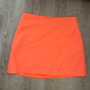 coral mini skirt